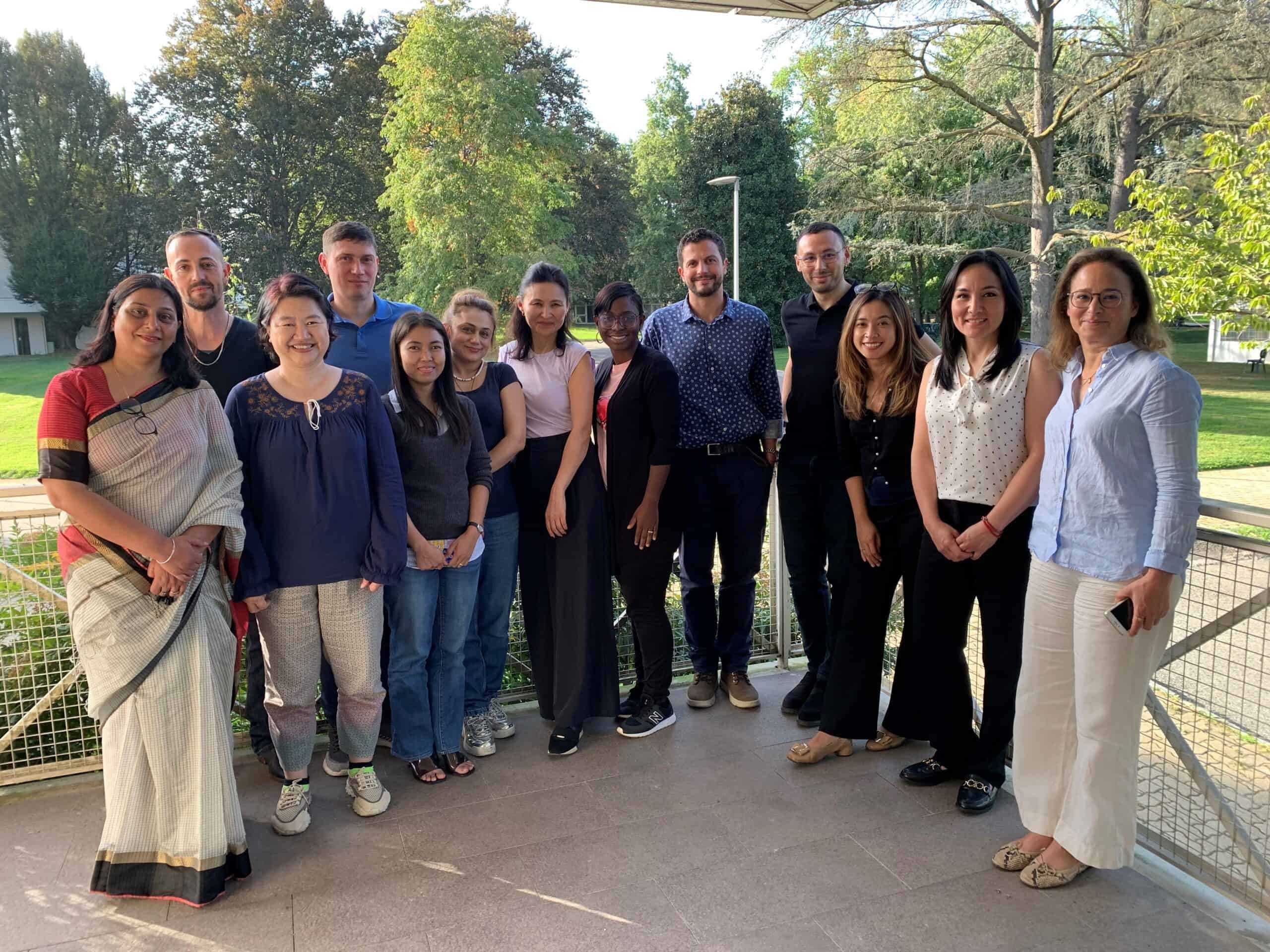 A group of people posing for a photo as part of the South South Exchange event in Turin 2023.