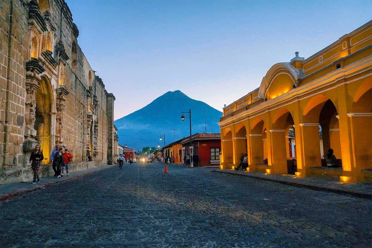 View of a volcano from a city center in Guatemala