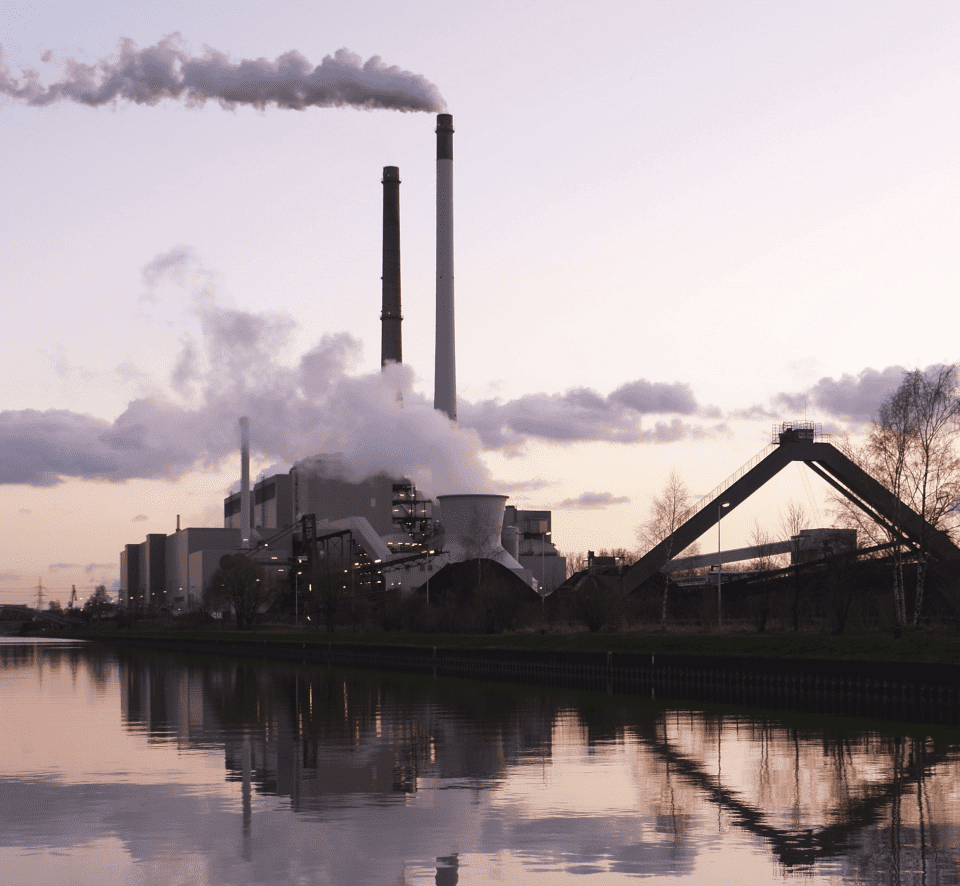 Factory overlooking lake