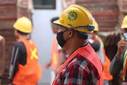 workers with helmets