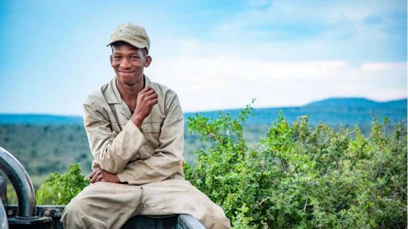 A farmer restoring an ecosystem -Boy and Landscape - South Africa
