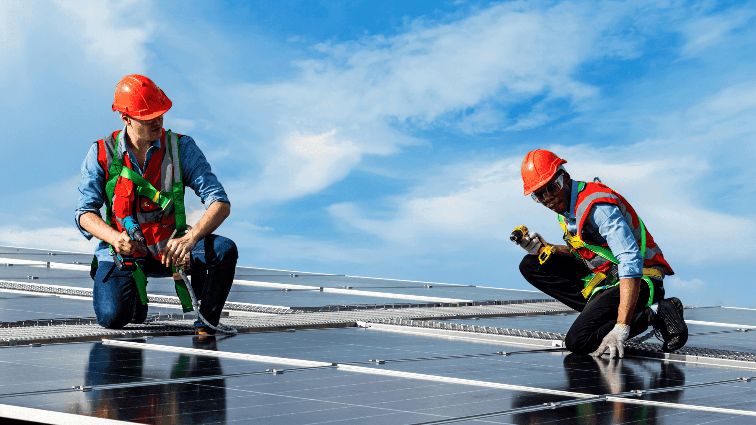 Workers on a solar panel